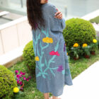 Blue denim-look abaya with oversized multicolor floral embroidery on the back